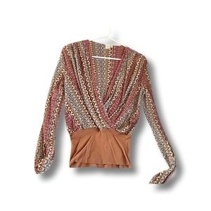 Earth tone print Light weight long sleeve mesh fabric.